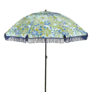 Vrolijk gekleurde parasols met franjes: dé zomerse trend van 2025 de interieurcharmeur fonq.nl blauw groen bloemen